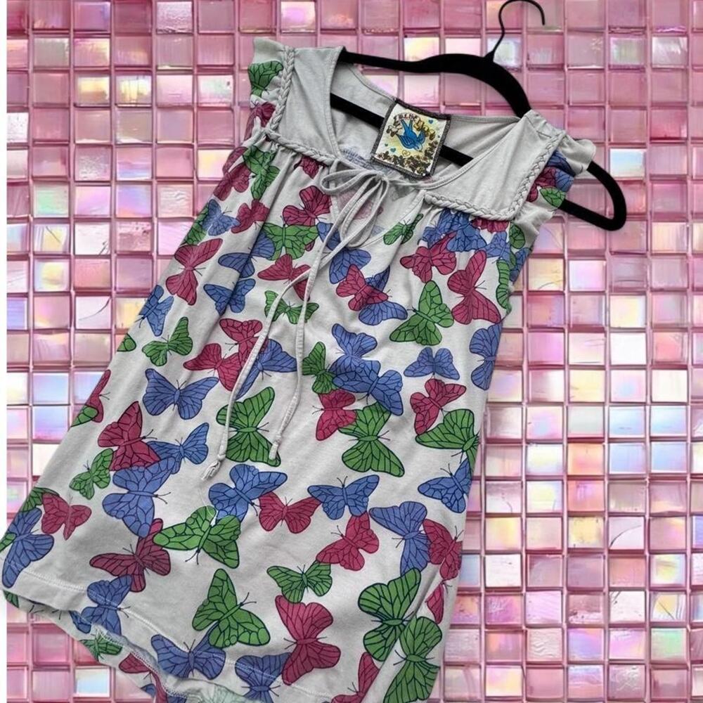 Blue butterfly blouse covered
